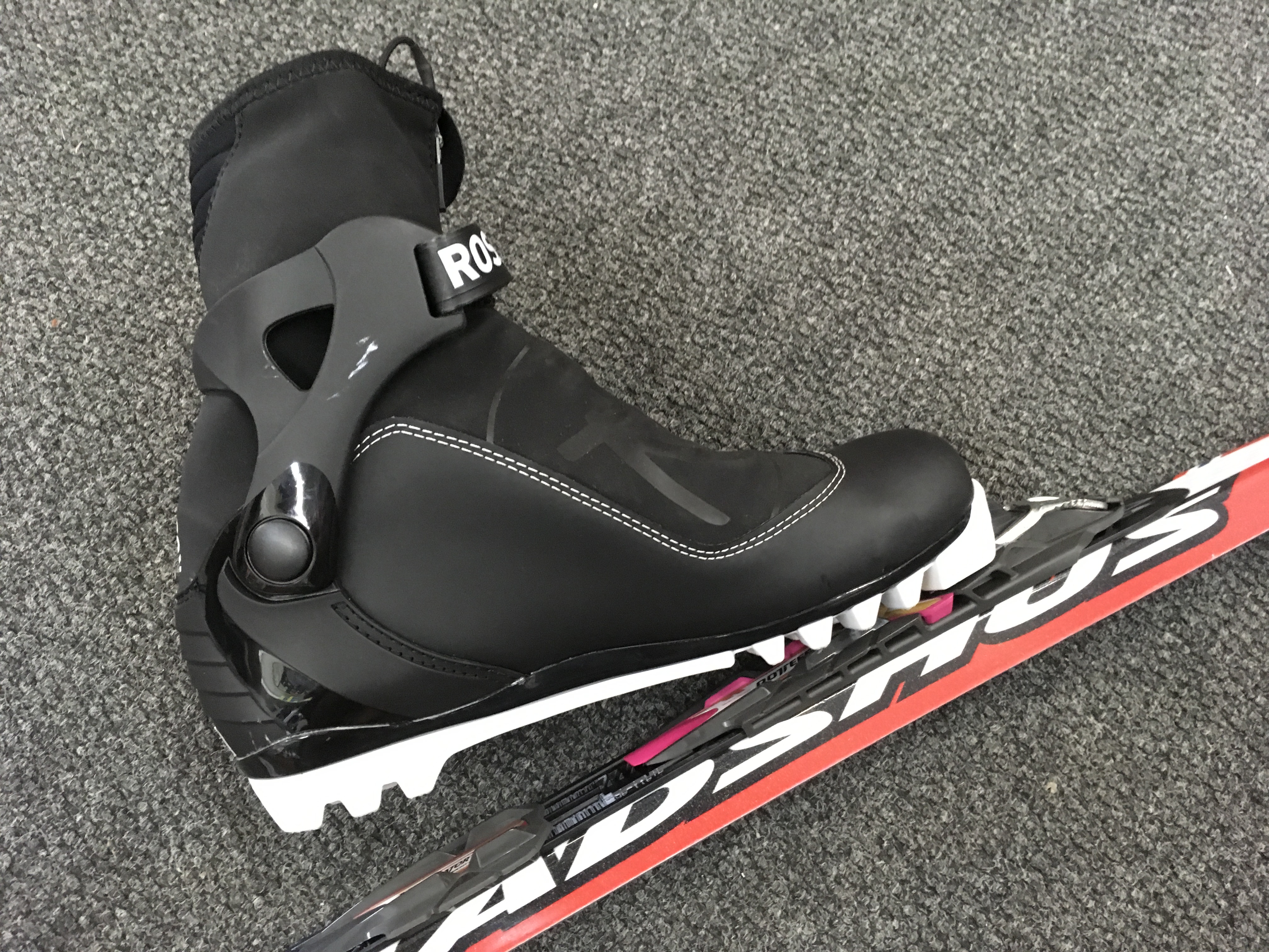 A track ski for xc ski racing with boot